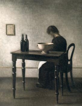 威爾漢姆 哈莫脩依 Young woman sitting behind a table